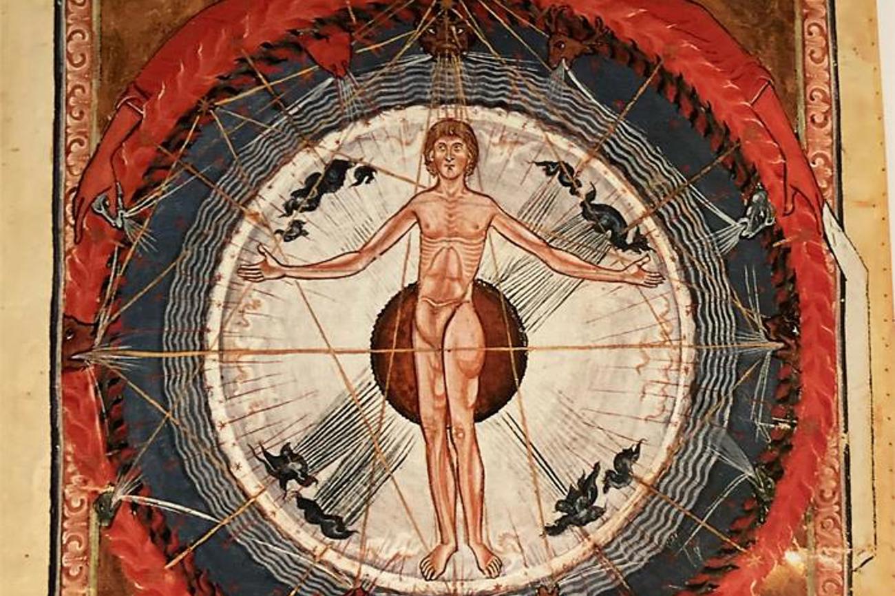Das Kosmosrad (Bildausschnitt) der Hildegard von Bingen aus ihrem «Buch der göttlichen Werke». Unten im Bild sie selbst als Empfängerin dieser Schau. Quelle: zVg